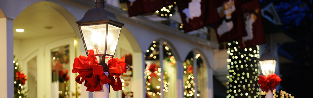 Independent hotel lobby decorated for the holiday season with garlands.