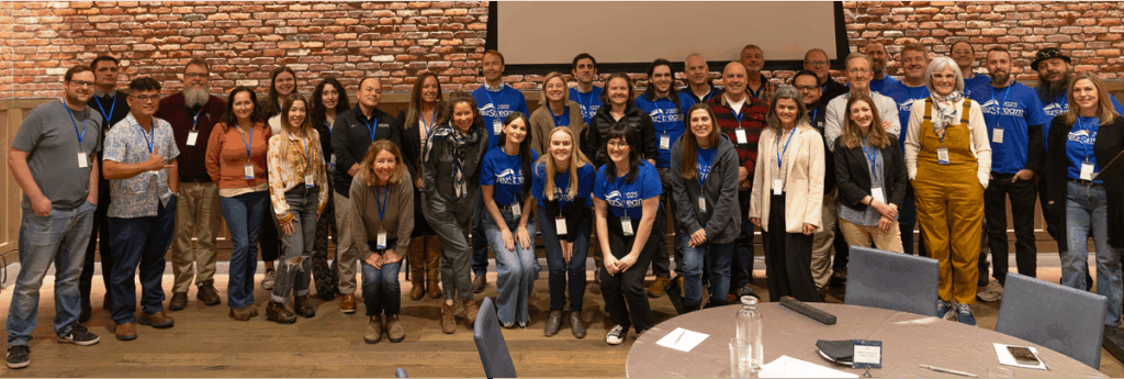 Attendees and staff of the 2025 rezStream Customer Success Conference gathered for a group photo at the Maven Hotel.