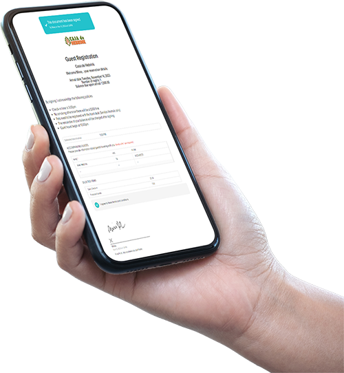 Hand holding a smartphone displaying a completed digital guest registration form with a signed confirmation message.